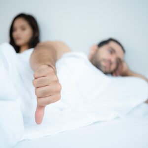 Couple in bed unhappy in sex It's a relationship problem in a married life.