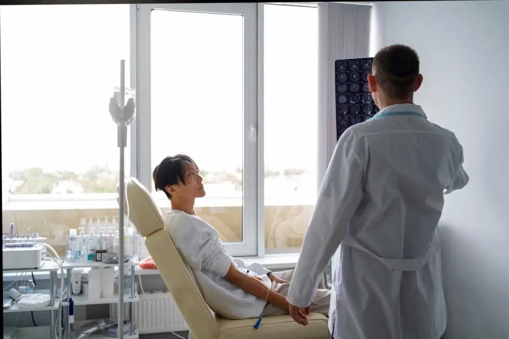 A person receiving IV treatment from a mobile iv therapy service