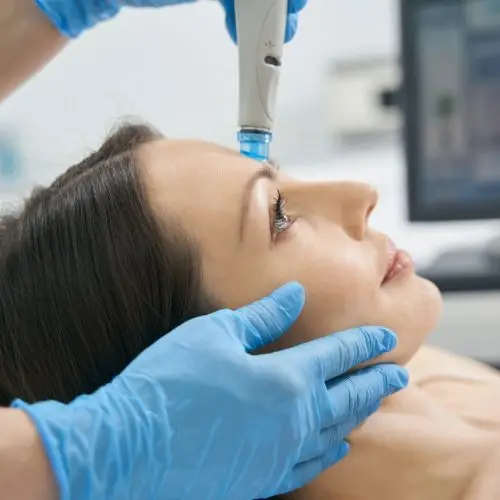 a woman receiving aesthetics treatment | The IV Lounge
